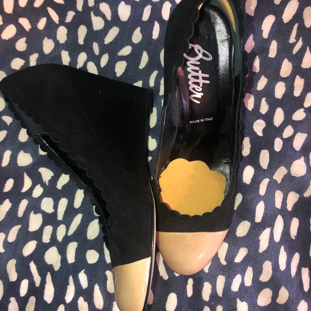 Wedged black and nude heels